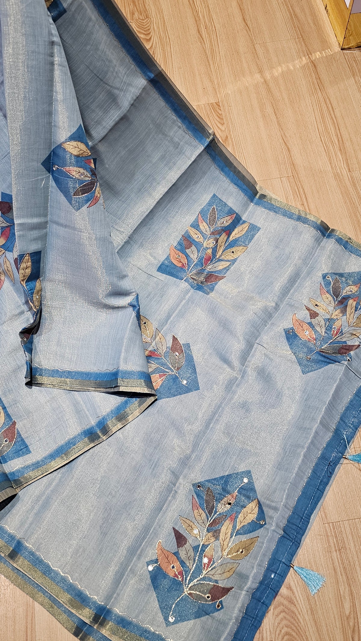 Elegant Light Blue Tissue Linen Saree with Leaf Motifs | Naanal