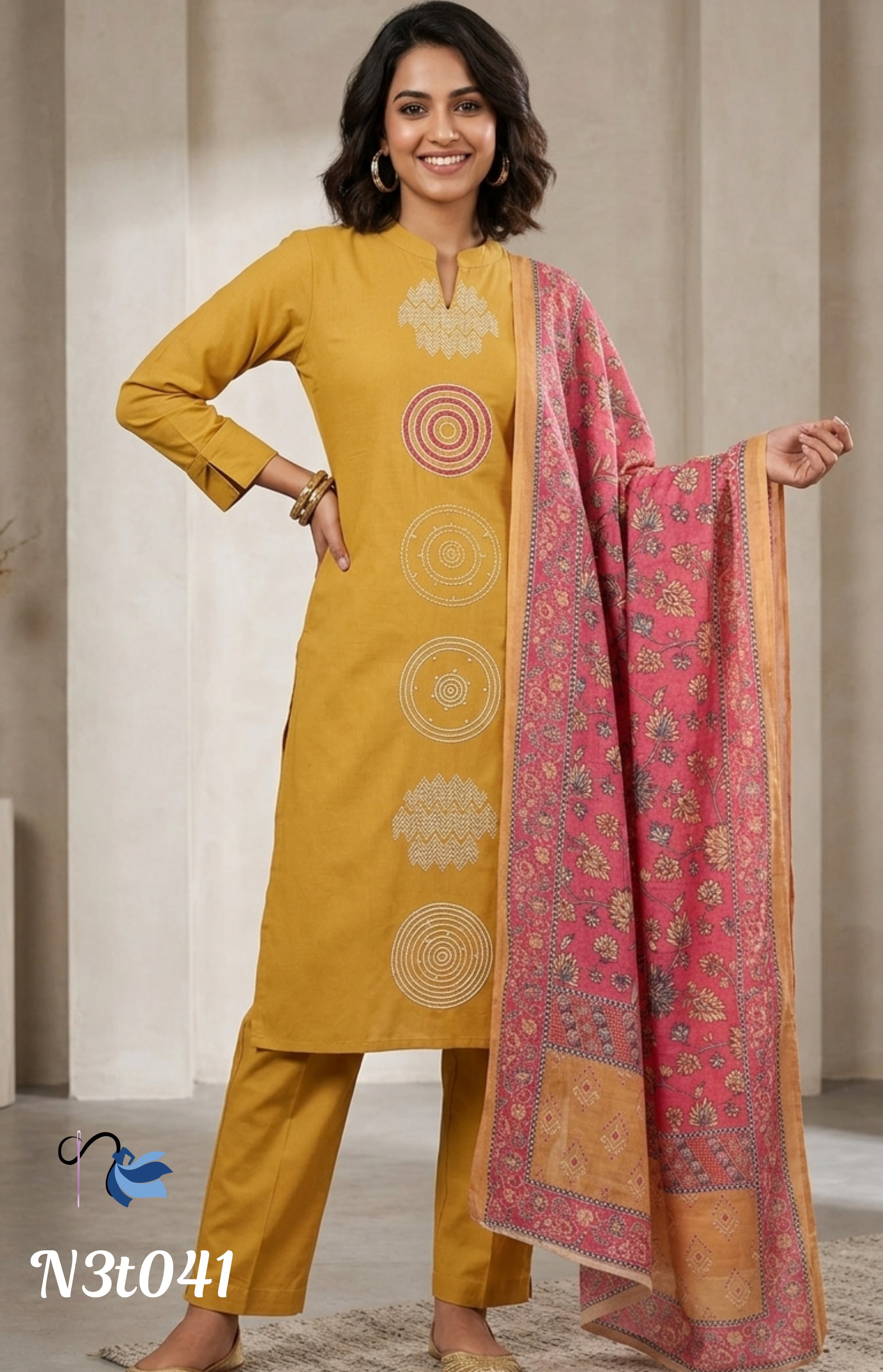 Mustard yellow pure handloom cotton kurta and pant set paired with a vibrant pink printed dupatta.